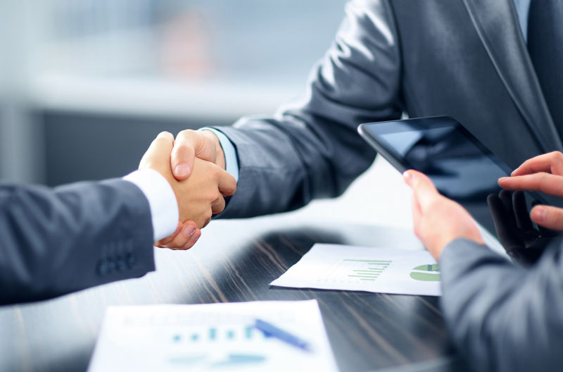 Business men shake hands